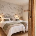Chambre alpine aux lits jumeaux