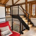 Palier de chalet, bois et lumière